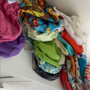 Cloth diapers, liners, fasteners, diaper sprayer